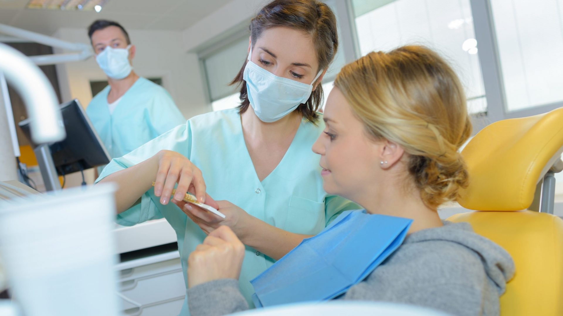 dentist having a conversation with the patient dentist having a conversation with the patient